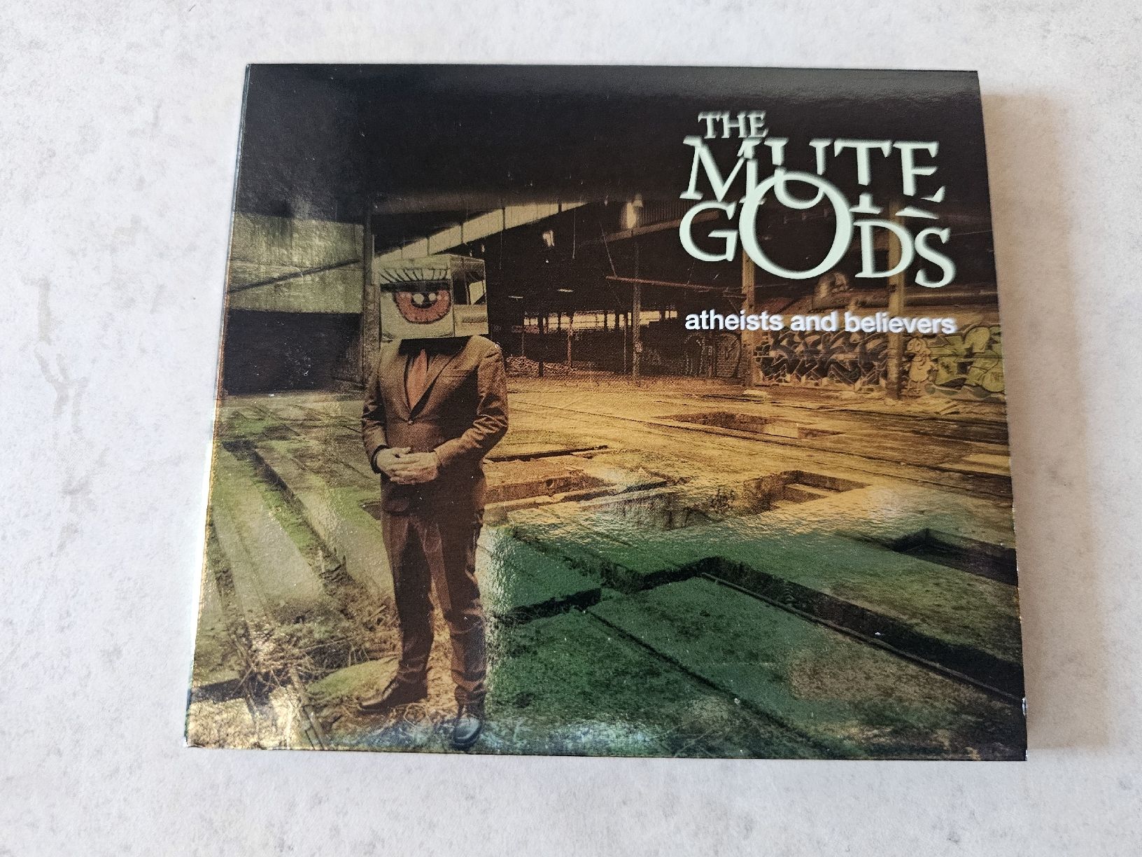 CDs: The Mute Gods  -  Atheists And Believers – Gebraucht aus Schneisingen von backstore24