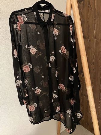 Camicia lunga taglio asimmetrico