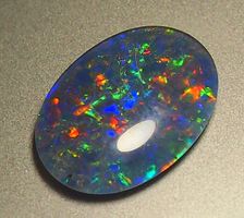 6,21 ct. Multicolour Blackopal-Triplet AAA