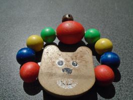 Greifling Hund, bunte Holzkugeln, Glöckchen