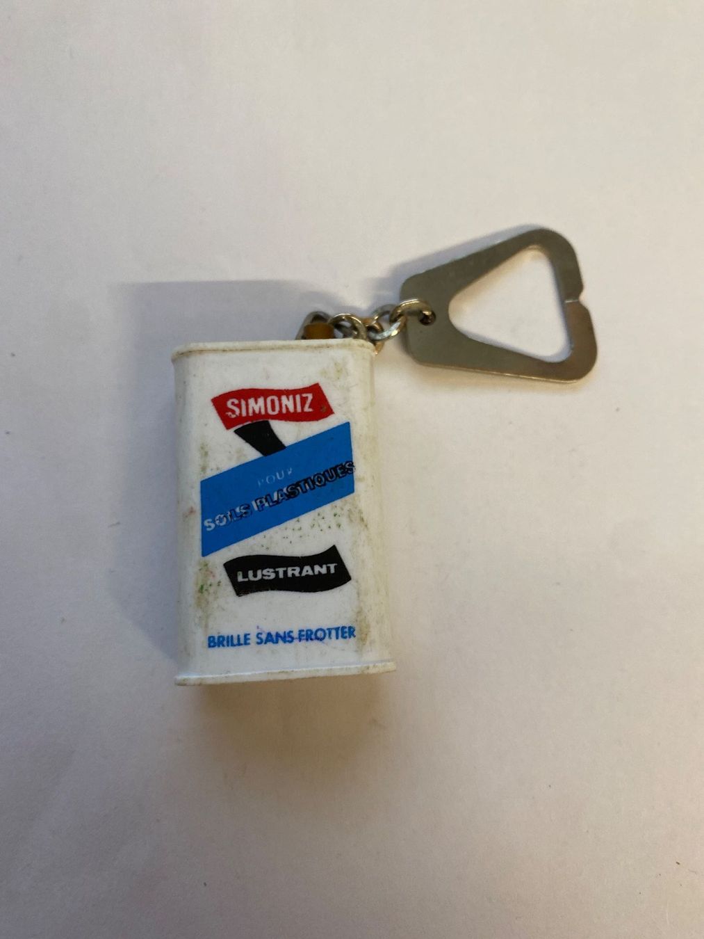 Portachiavi: Porte-clés Simoniz publicitaire, décapsuleur, occasion – Usato da Le Brassus venduto da cinema13 1