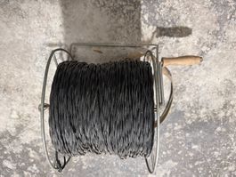 F-Draht Leiter auf Spule mit Kurbel metallisch