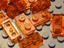 Lego 24x Platten 1x2 (3023) trans.orange