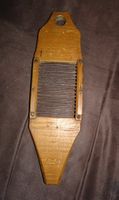 Ancienne râpe en bois