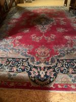 Grand tapis oriental traditionnel rouge motif floral