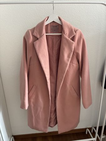 Manteau rose taille M en bon état général