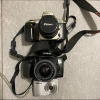 Drei Kameras Nikon, Minolta & Traveller