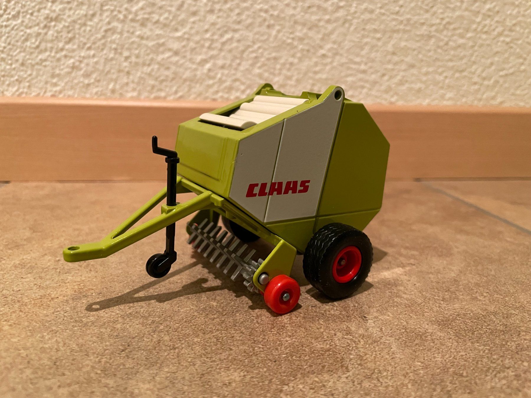 Claas Tutte le macchine: SIKU Claas Rundballenpresse – Nuovo e nell'imballaggio originale da Kreuzlingen venduto da Stefan1150