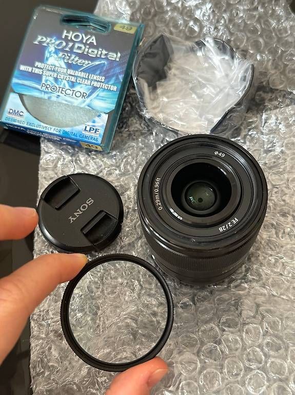 Sony Objectifs: Sony SEL FE 28mm F 2,0 OVP + Filter – D'occasion à Zürich par ana_s7dl