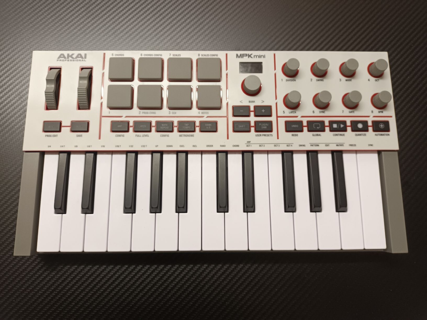 Akai Strumenti musicali: Tastiera controller Akai MPK Mini bianco grigio  – Usato da Caneggio venduto da matte123