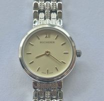 Montre Bucherer 902.510 femme dorée bracelet argenté