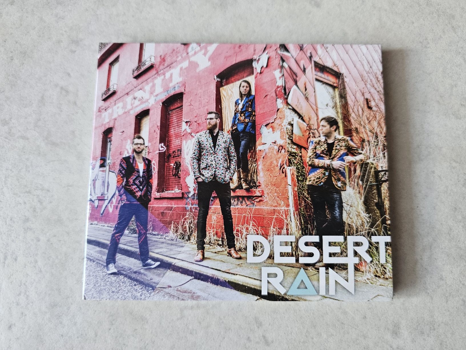 CDs: Trinity  -  Desert Rain  /  Fabrikneu – Neu und originalverpackt aus Schneisingen von backstore24
