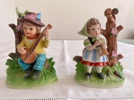 2 dekorative Porzellan-Figuren mit Musikinstrumenten