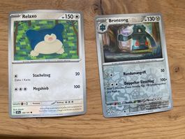 2 Pokemon Sammelkarten: Relaxo und Bronzong