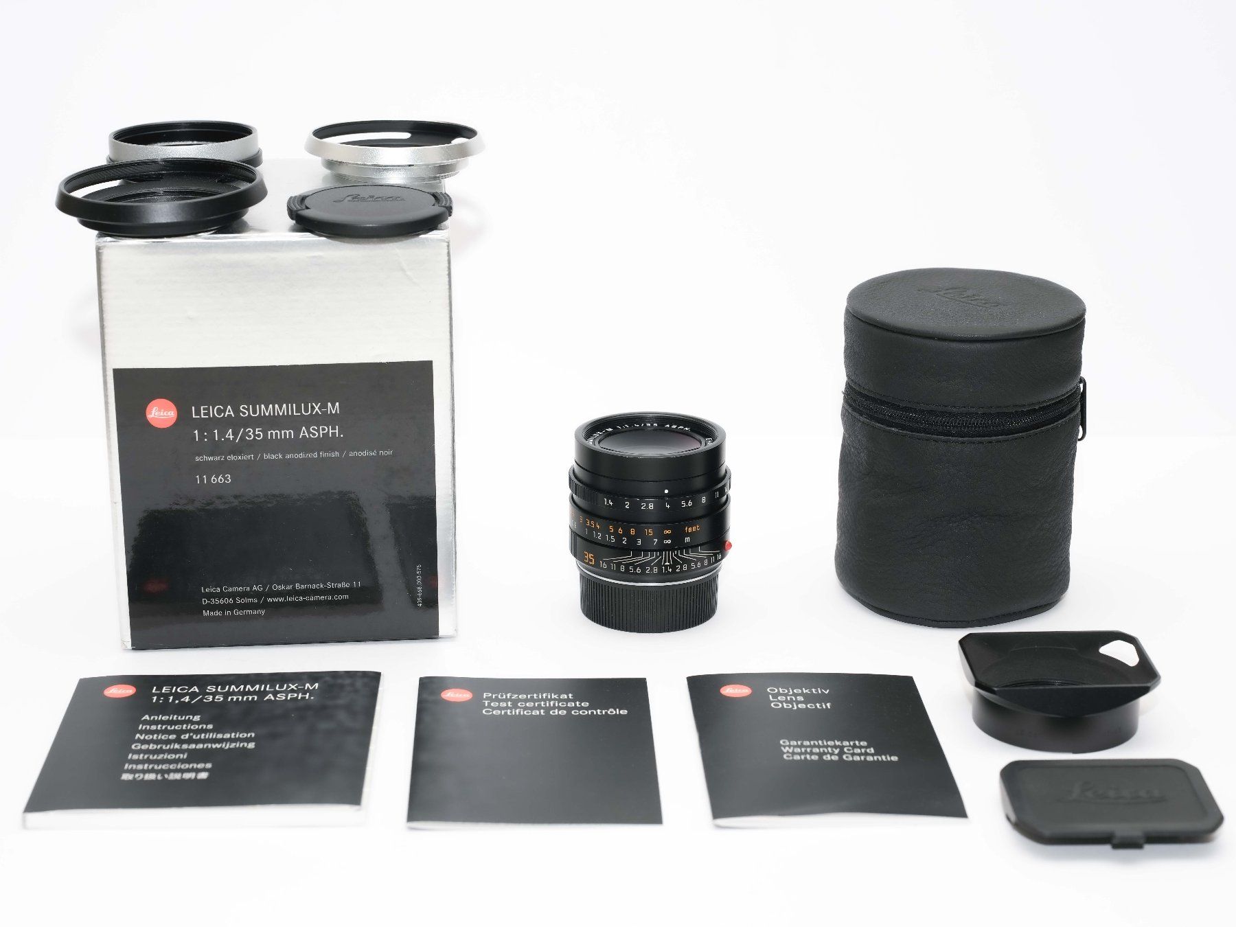 Leica Obiettivi: Leica Summilux FLE 35mm 1,4 TOP, complet + accessoires – Usato da Lausanne venduto da 1000steps