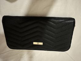 New black wallet with tags
