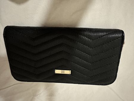 New black wallet with tags