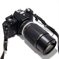 Nikon EM + 1:3,5/75-150mm