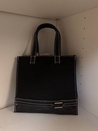 Estée Lauder black handbag with interior separate pochette