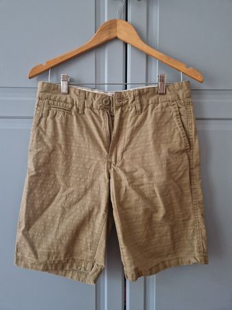 Short homme beige taille 40, idéal pour l'été! Très bon état