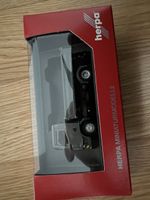MAN TGL CC 3-Seiten-Kipper grau/gelb Herpa