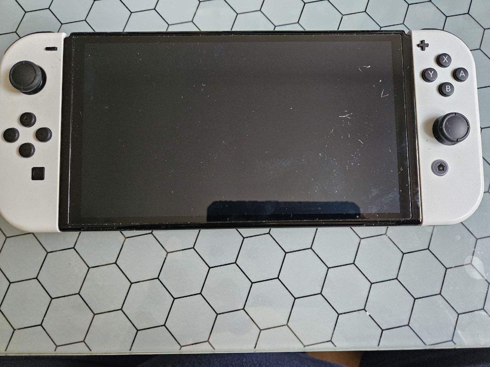 Nintendo Console: Nintendo Switch Oled avec 5 jeux  – Usato da Genève venduto da Pedro67 1