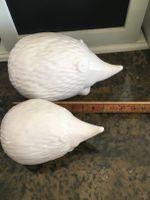 2 hérissons en porcelaine blanche