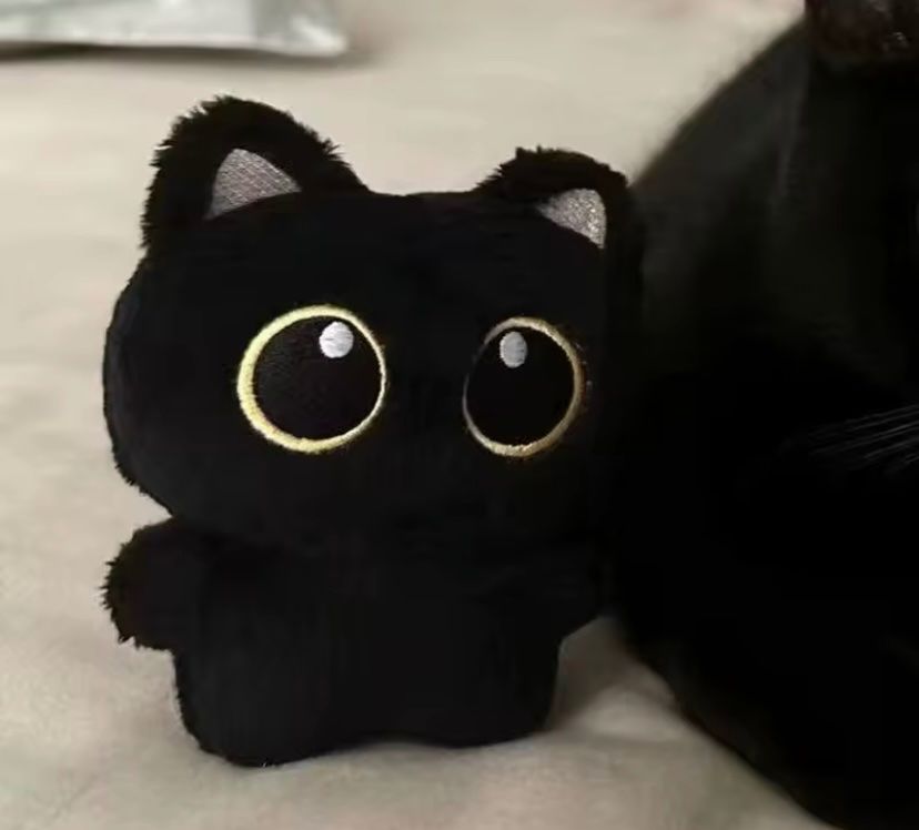Giocattoli: Katze Plüschtier schwarz grosse Augen – Nuovo e nell'imballaggio originale da Zürich venduto da Gamecards 3