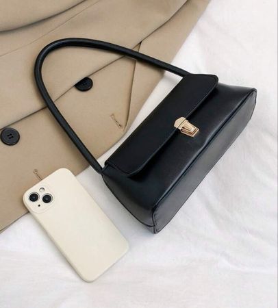 Petit sac à main noir style pochette état neuf