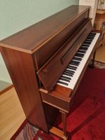Piano droit Seiler bois verni bon état