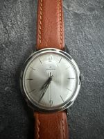 Montre homme Zenith mécanique boîtier acier vintage