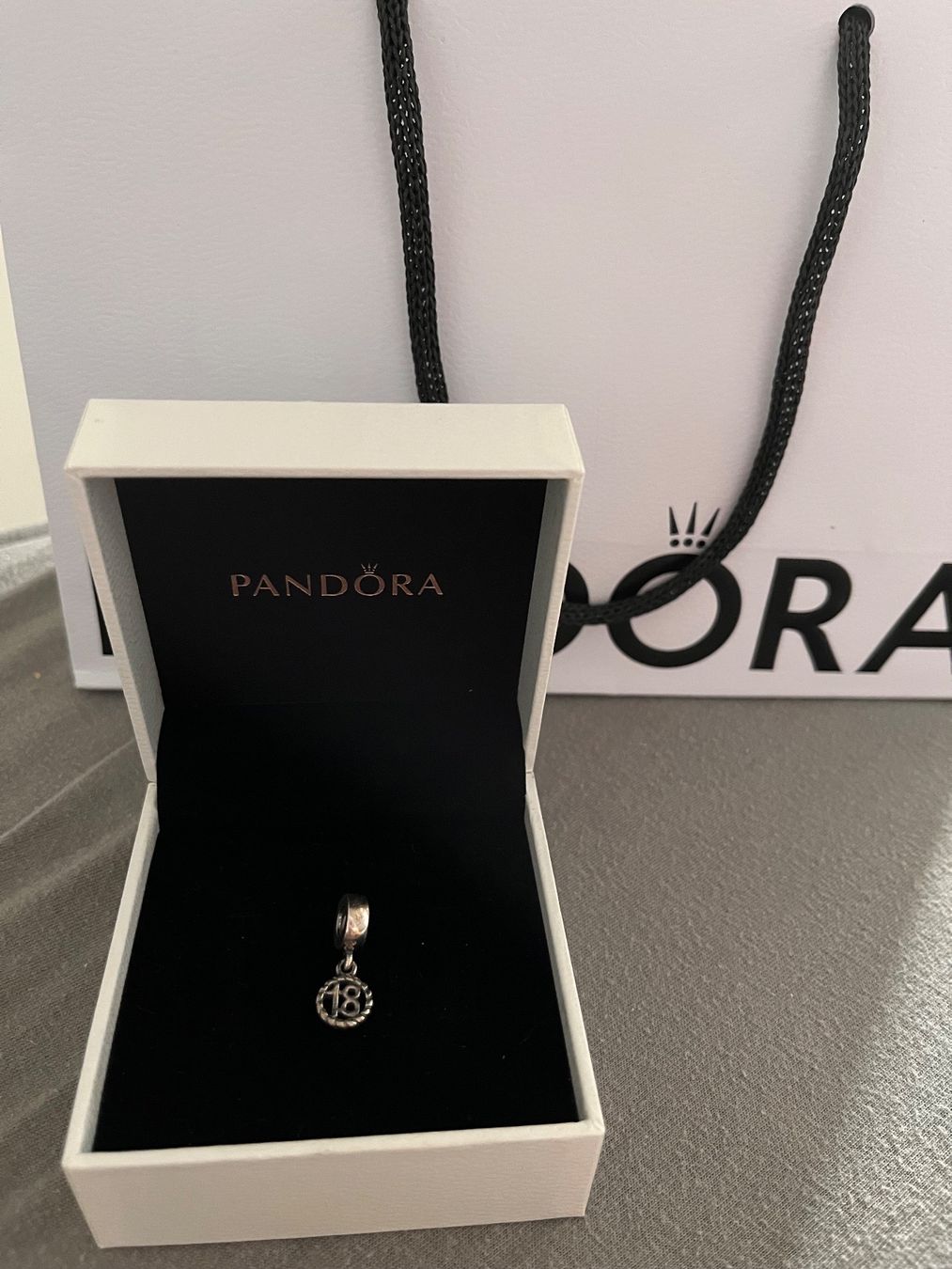 Pandora Anhänger: Pandora 18 Charm – Gebraucht aus Rüti ZH von xweeknd