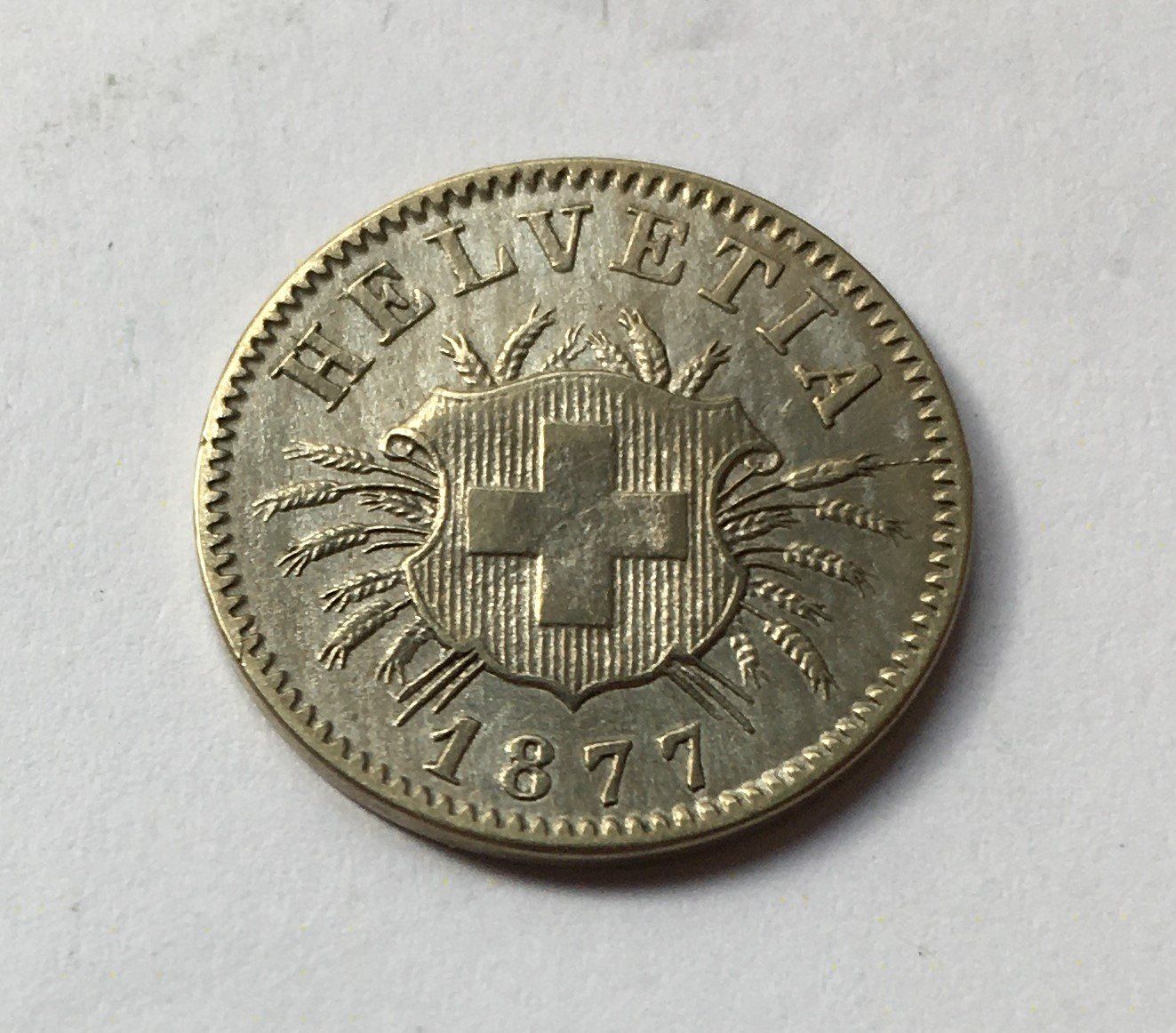 Tutti le monete: 1877 5 Rappen -unz – Usato da Kirchberg SG venduto da Helveticus00