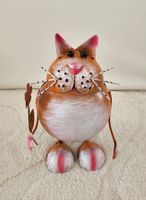 Wackelkatze, Metall