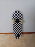 Skateboard checkerboard pattern with wheels used condition