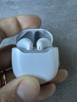 écouteurs Bluetooth blancs bon état