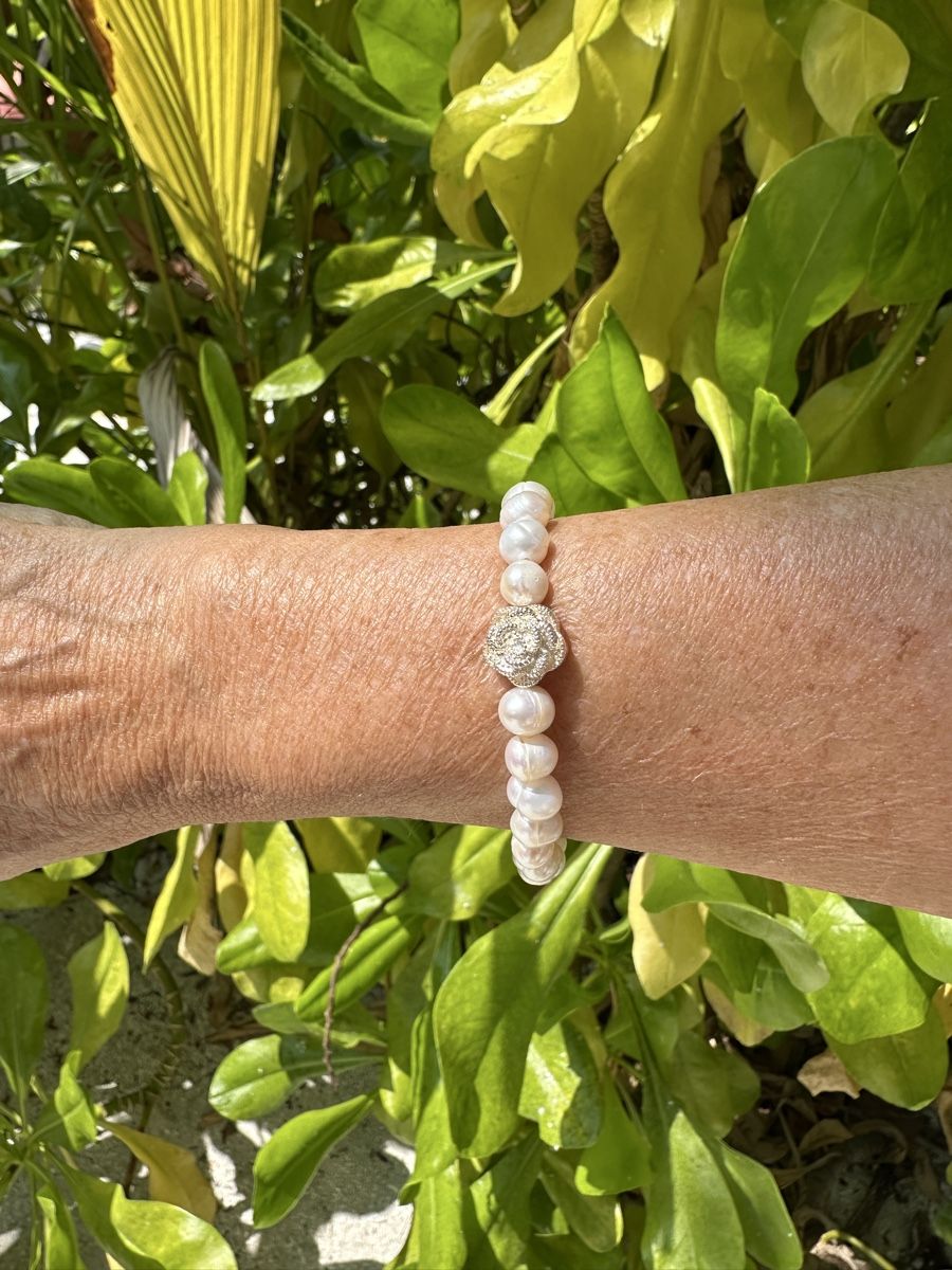 Bracciali & Braccialetti: Perlenarmband mit silberblume – Nuovo e nell'imballaggio originale da Niederglatt ZH venduto da Silberschmuck-design