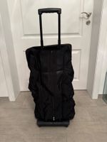 Longchamp - Grand sac de voyage à roulettes pliable