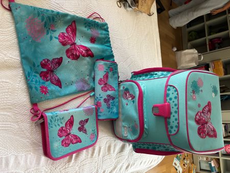 Set scolastico con farfalle turchese fucsia