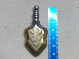 Vintage brass pendant parfume bottle.