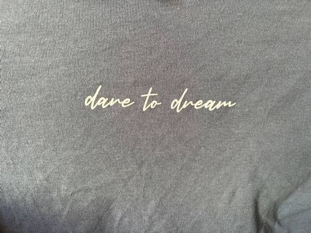 Tally Weijl blue long sleeve top with "dare to dream" text
