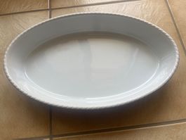 Plat ovale en céramique émaillée marron ancien