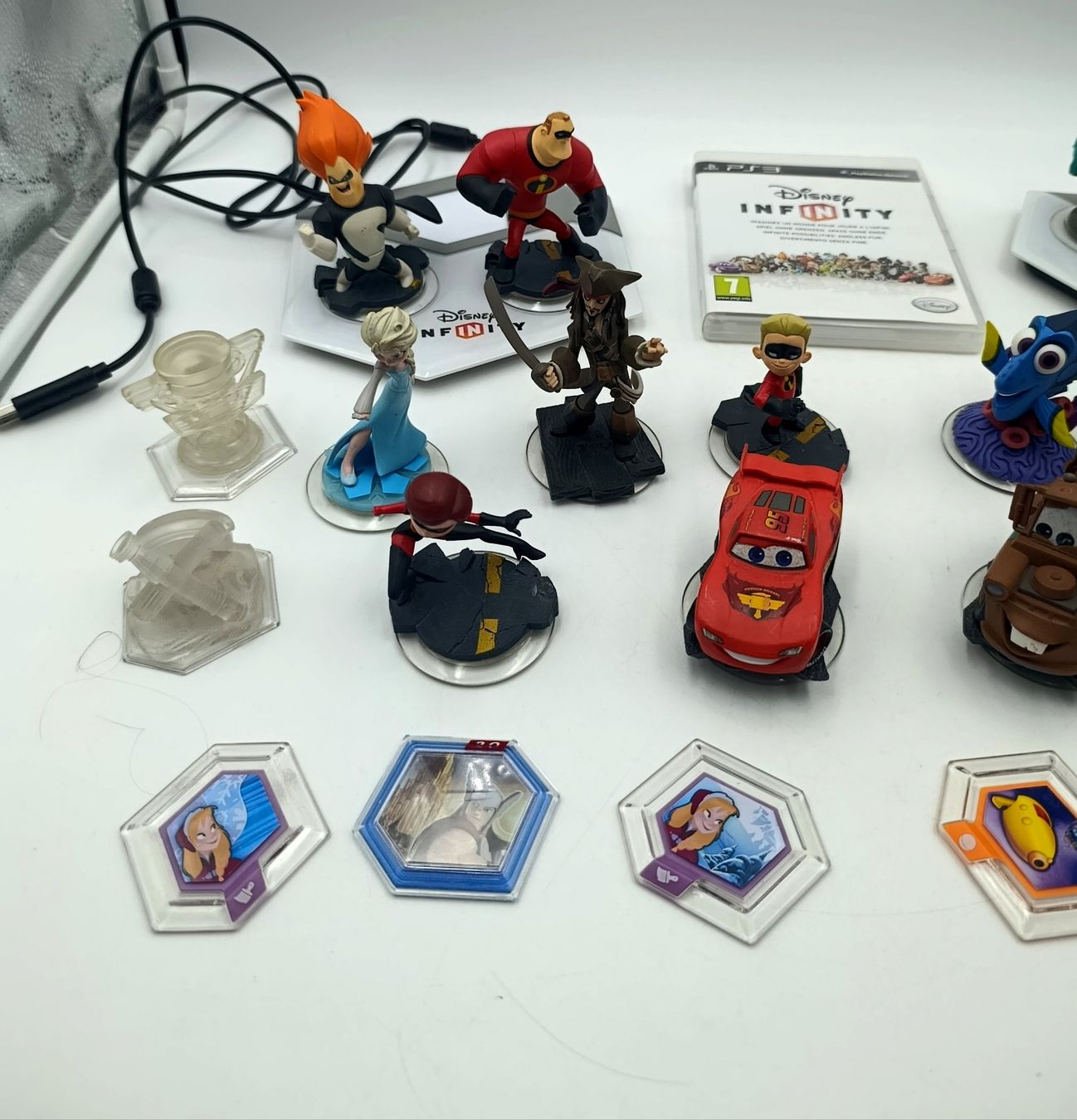Disney Giochi: Disney Infinity Figuren und Spiel PS3 Konvolut – Usato da Wil SG venduto da Donaldus 1