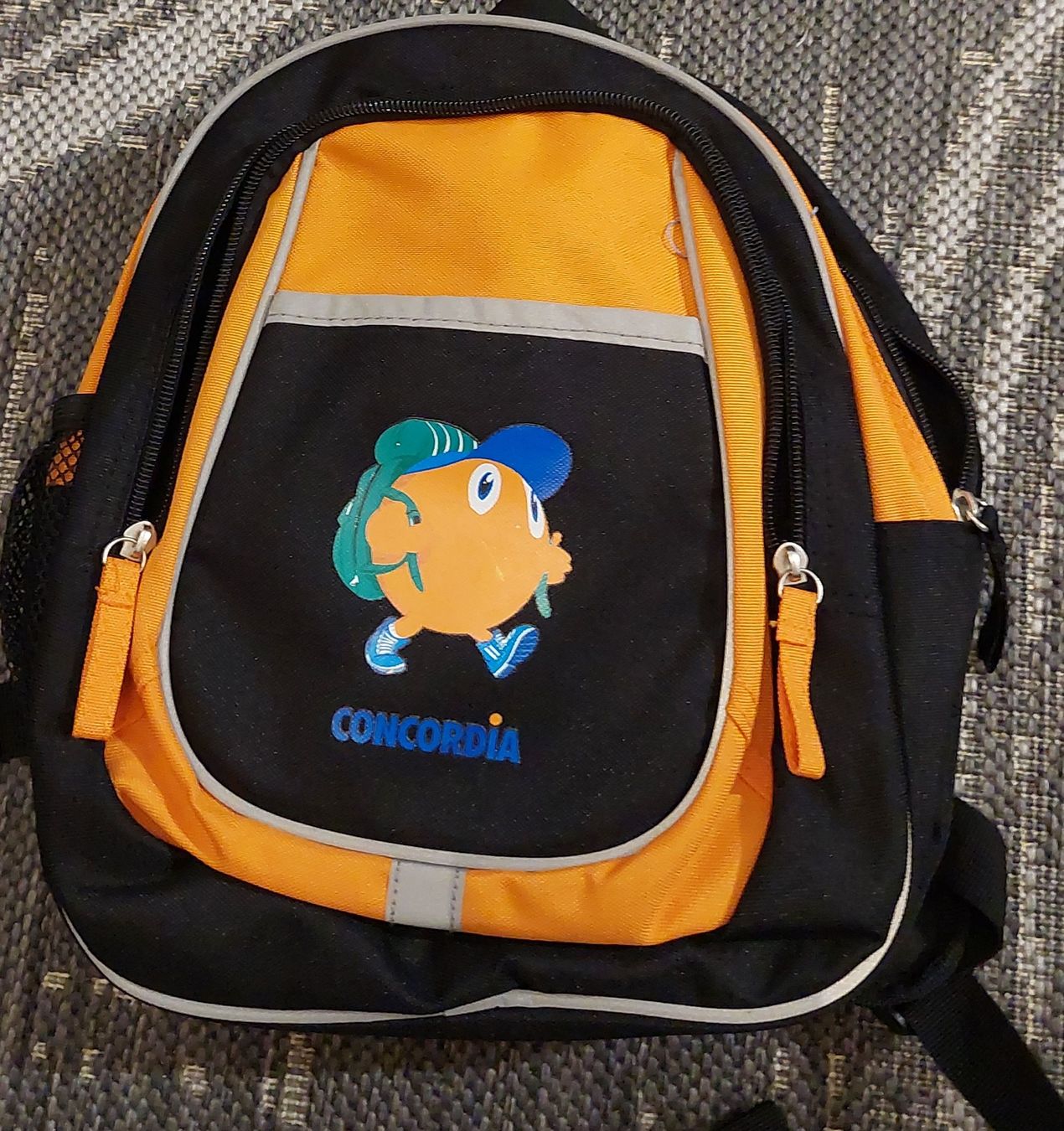 Kindertaschen: Kinder Rucksack Concordia orange/schwarz Neu – Neu und originalverpackt aus Egolzwil von mobiledeluxe