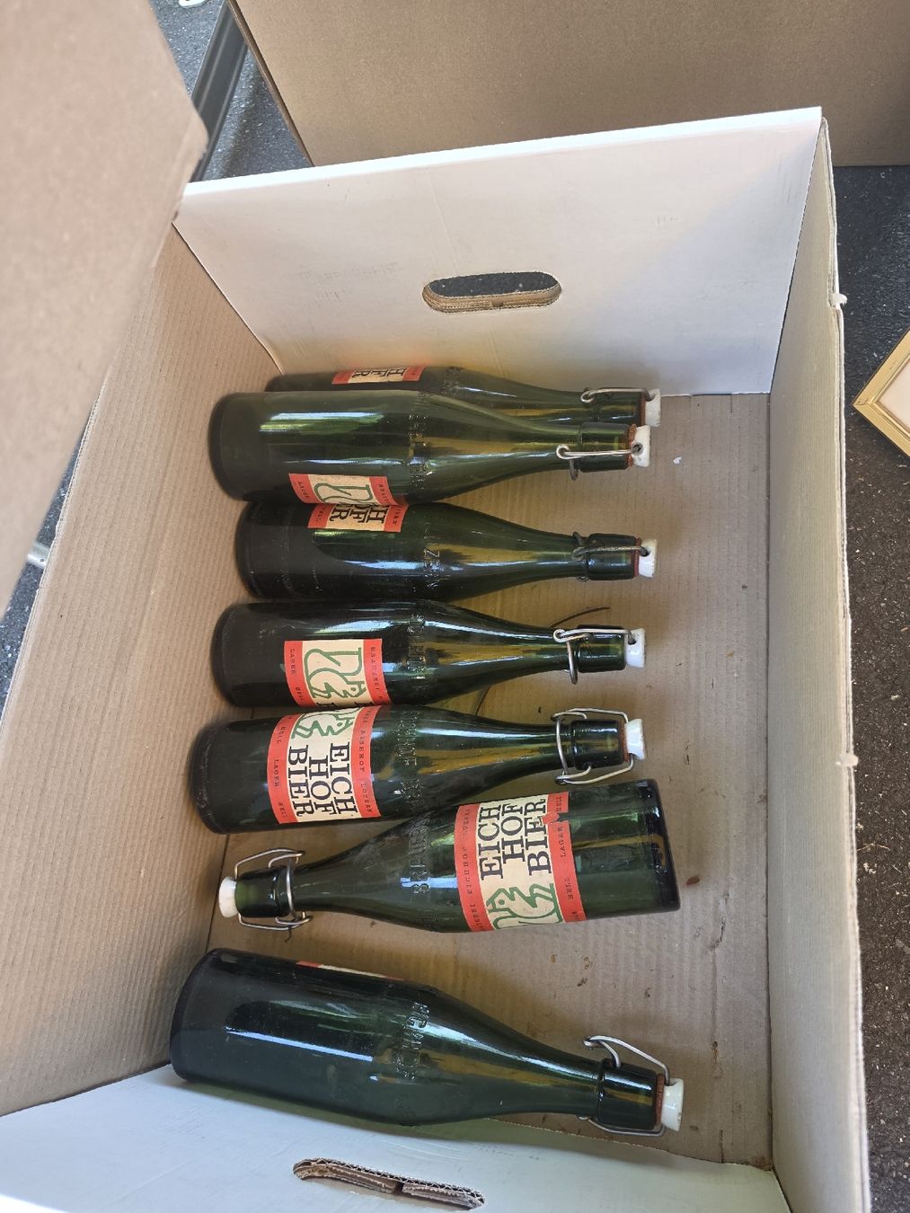 Eichhof Bicchieri, Caraffe & Bottiglie: 7 Bierflaschen Eichhof 63 und Jg. 1964 – Usato da Kriens venduto da Clevero