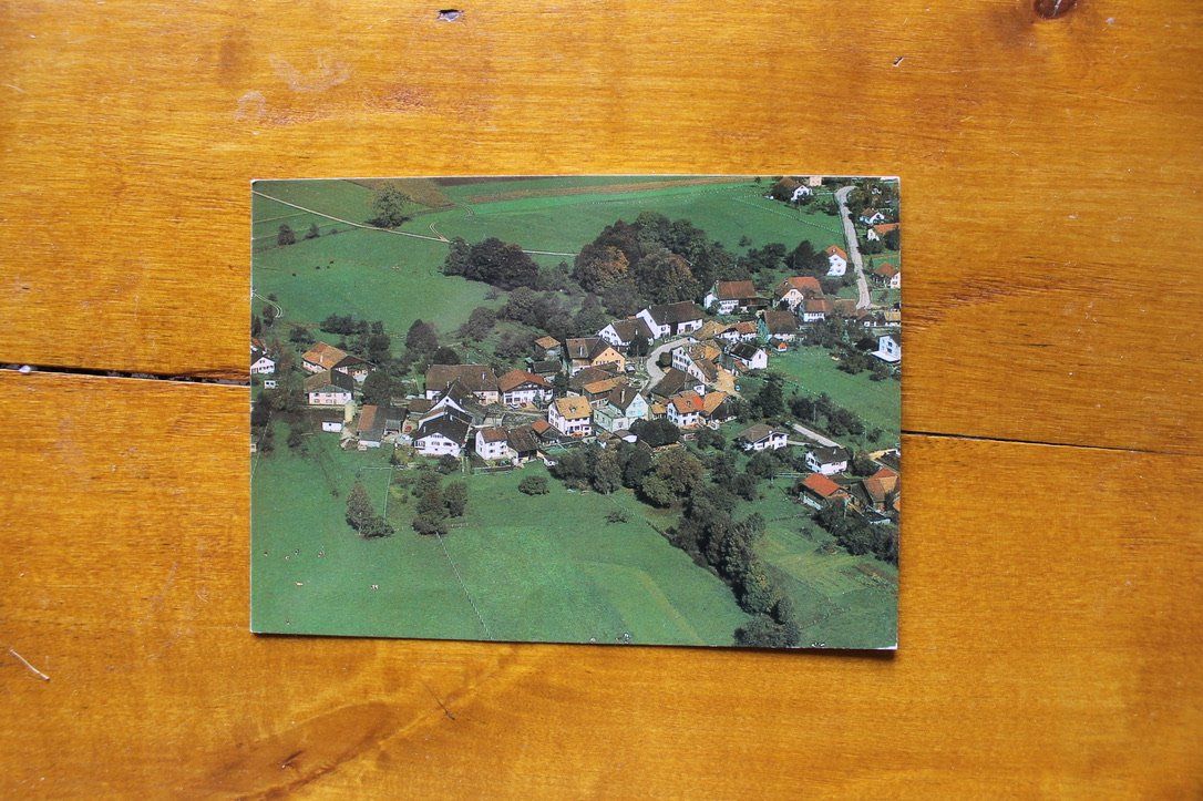 Ansichtskarten: AK Rossemaison, Dorfblick Flugaufnahme – Gebraucht aus Oftringen von kambodo