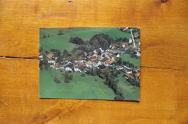 AK Rossemaison, Dorfblick Flugaufnahme