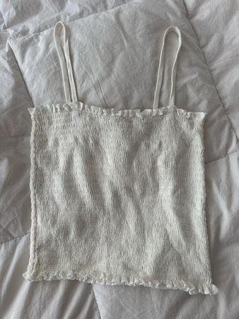 Top court Brandy Melville blanc smocke etat correct