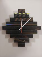 Hockey stick clock Warrior 27x27 cm 