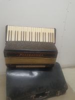 accordéon à piano Nussbaumer avec coffre 